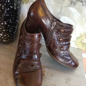Aerosols brown leather shoes